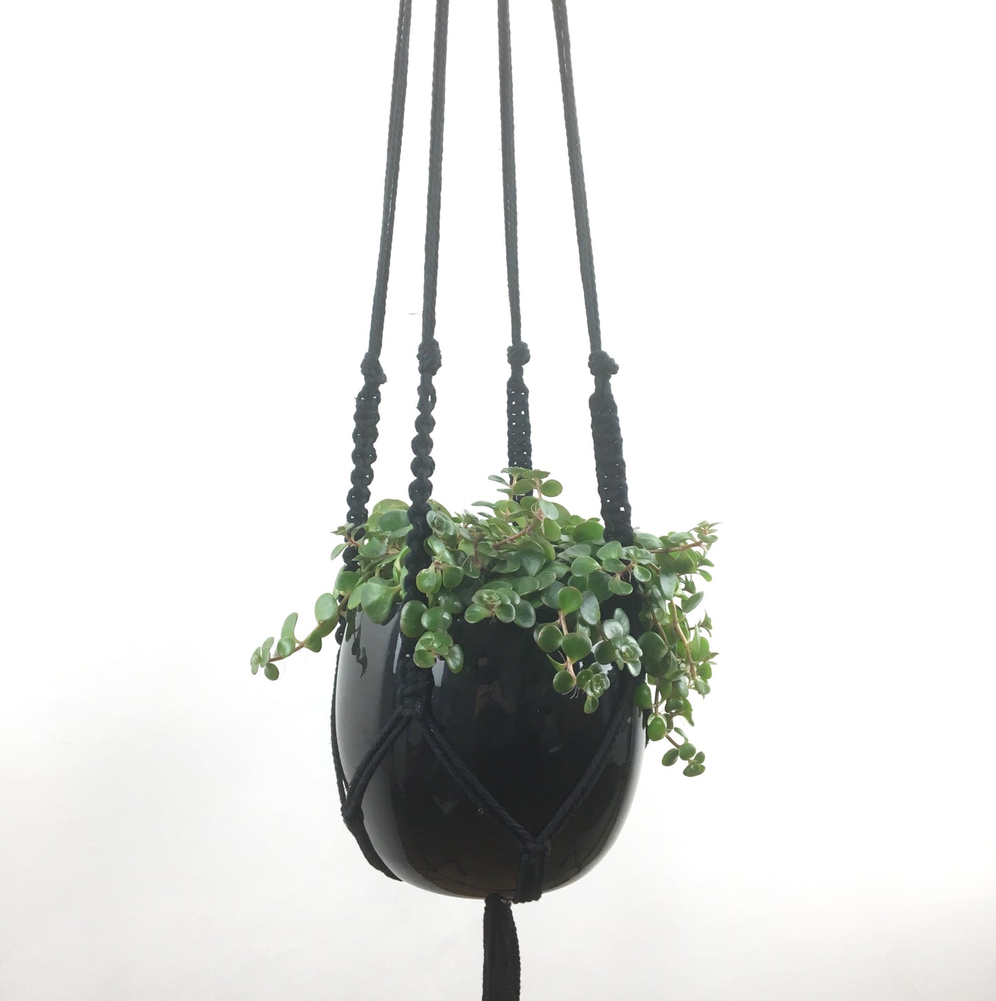 Grote zwarte macramé hanger
