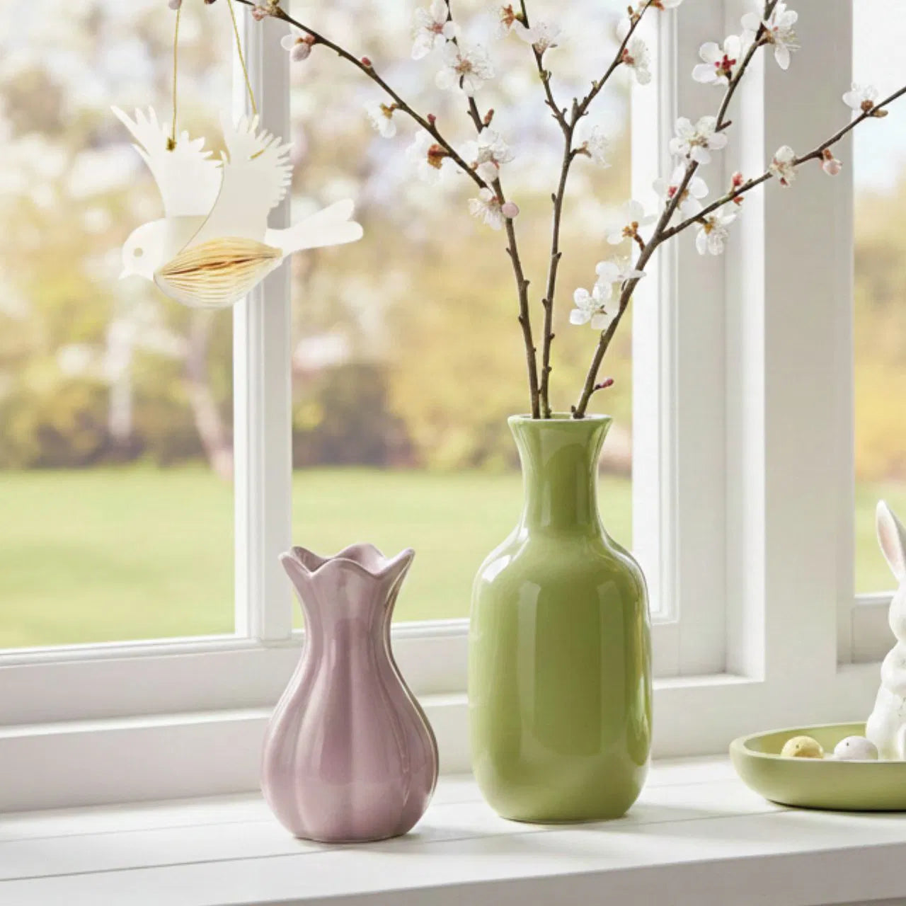 Hangende vogel van papier/karton