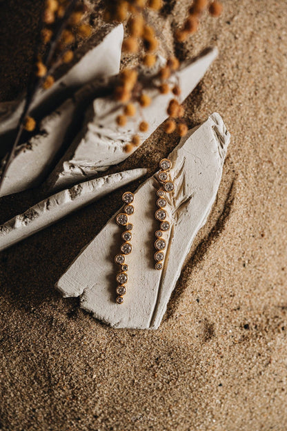 Trapsgewijze kristallen oorbellen. Eleonora