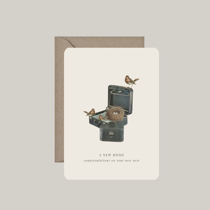 Postkaart 'a new home' met enveloppe
