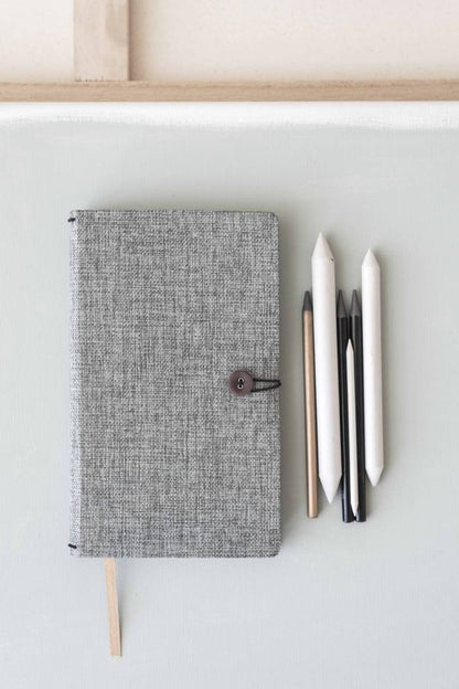 Notebook met knoop