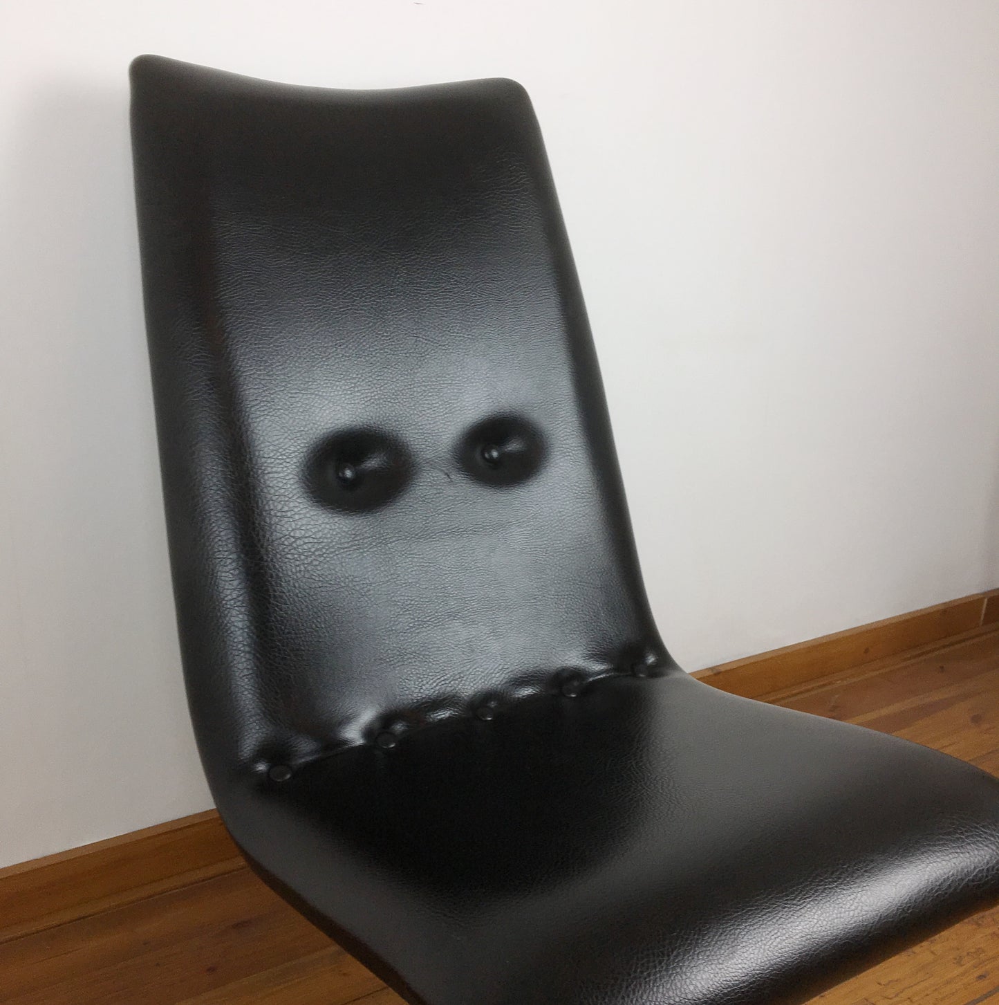 Zwarte vintage relaxfauteuil